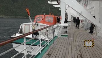 Lowering a tender aboard Artania