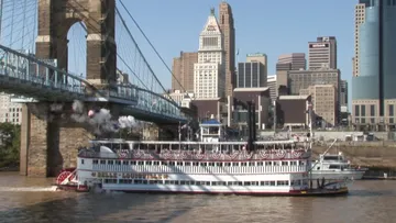 Belle of Louisville passes the John A. Roebling Suspension Bridge at Cincinnatti