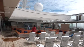 Opening the pool deck canvas aboard HANSEATIC nature 