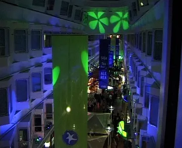 The enclosed promenade deck of Silja Symphony during the evening