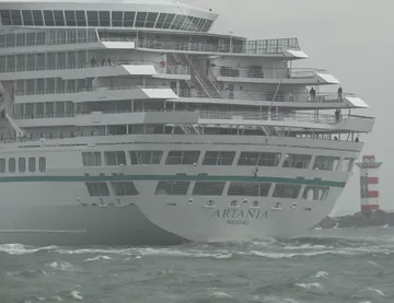 Artania transits the harbor of IJmuiden