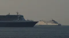 QM2 & Pride of Hull navigating the anchorage of Rotterdam